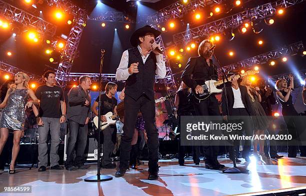 Musicians Kix Brooks and Ronnie Dunn of the band Brooks & Dunn perform onstage with musicians Carrie Underwood, Jay DeMarcus, Gary LeVox, Keith...