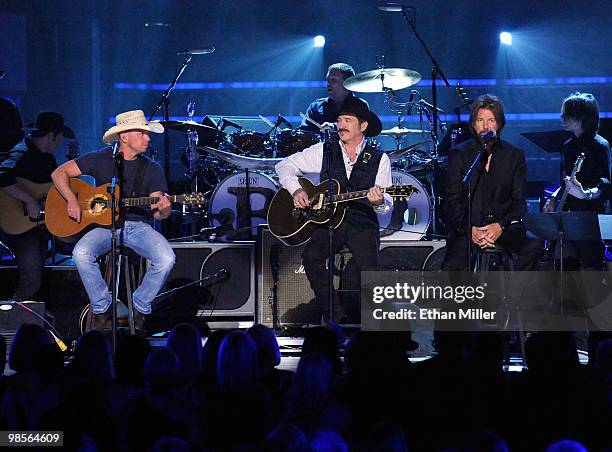 Musician Kenny Chesney, musicians Kix Brooks and Ronnie Dunn of Brooks & Dunn perform onstage during Brooks & Dunn's The Last Rodeo Show at MGM Grand...