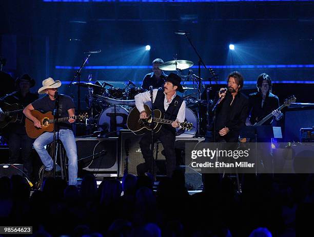 Musician Kenny Chesney, musicians Kix Brooks and Ronnie Dunn of Brooks & Dunn perform onstage during Brooks & Dunn's The Last Rodeo Show at MGM Grand...