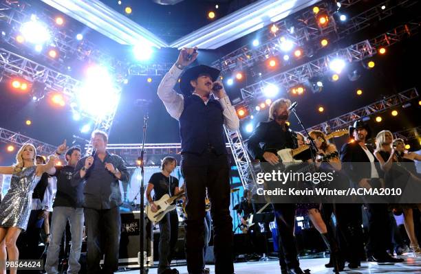 Musicians Kix Brooks and Ronnie Dunn of the band Brooks & Dunn perform onstage with musicians Carrie Underwood, Jay DeMarcus, Gary LeVox, Keith...