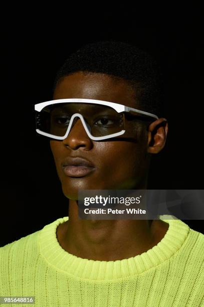 Model, sunglasses detail, walks the runway during the Kenzo Menswear Spring/Summer 2019 show as part of Paris Fashion Week on June 24, 2018 in Paris,...