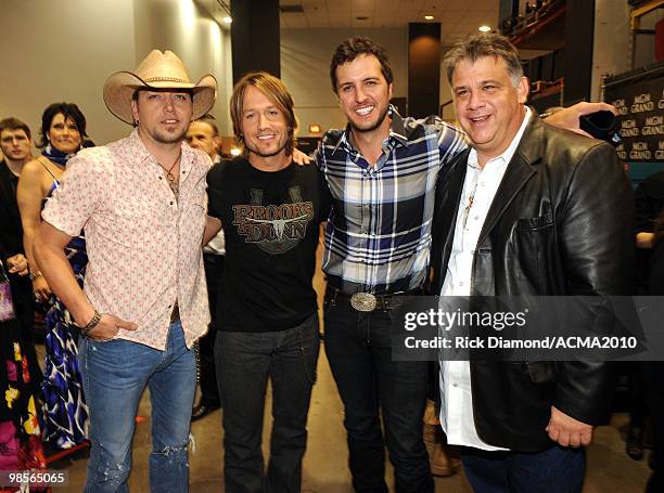 Musicians Jason Aldean, Keith Urban, Luke Bryan, and Executive Director Of The ACM Bob Romeo pose backstage during Brooks & Dunn's The Last Rodeo...