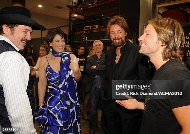 Musician Kix Brooks and wife Barbara Brooks with musicians Ronnie Dunn and Keith Ubrban pose backstage during Brooks & Dunn's The Last Rodeo Show at...