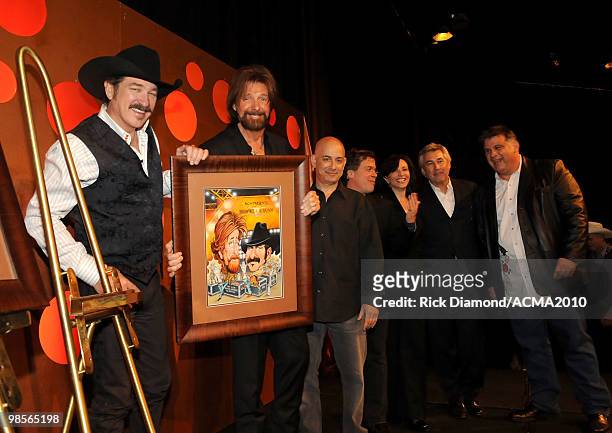Musicians Kix Brooks and Ronnie Dunn of Brooks & Dunn with Senior Vice President, Specials, CBS Entertainment Jack Sussman, Executive Producer of The...