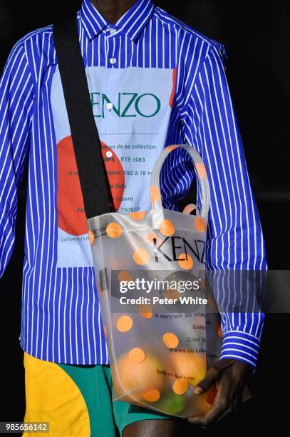 Model, bag detail, walks the runway during the Kenzo Menswear Spring/Summer 2019 show as part of Paris Fashion Week on June 24, 2018 in Paris, France.