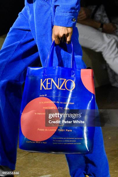 Model, bag detail, walks the runway during the Kenzo Menswear Spring/Summer 2019 show as part of Paris Fashion Week on June 24, 2018 in Paris, France.