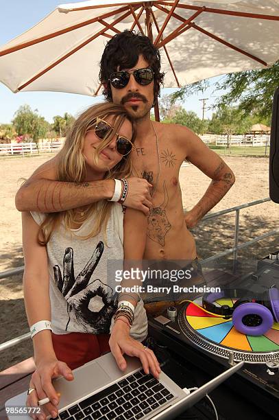 Musicians Pink and Devendra Banhart DJ at the LACOSTE Pool Party during the 2010 Coachella Valley Music & Arts Festival on April 18, 2010 in Indio,...