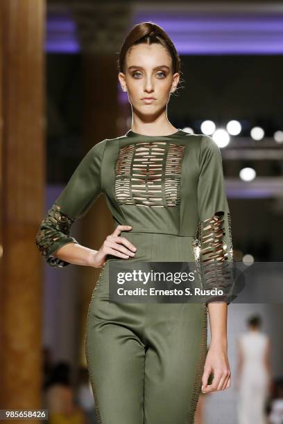 Model walks the runway at the Sabrina Persechino show during Altaroma at Palazzo delle Esposizioni on June 27, 2018 in Rome, Italy.