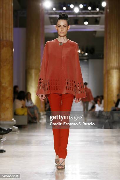 Model walks the runway at the Sabrina Persechino show during Altaroma at Palazzo delle Esposizioni on June 27, 2018 in Rome, Italy.