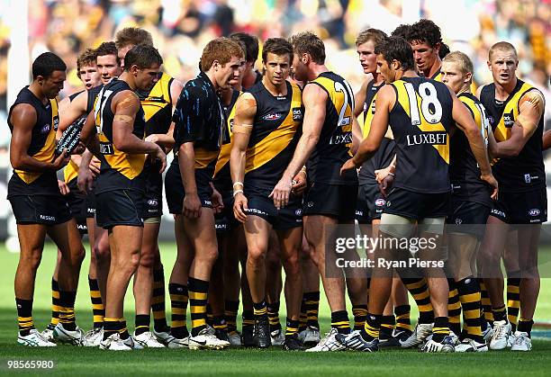 Brett Deledio of the Tigers speaks to his teammates during the round four AFL match between the Richmond Tigers and the Melbourne Demons at the...