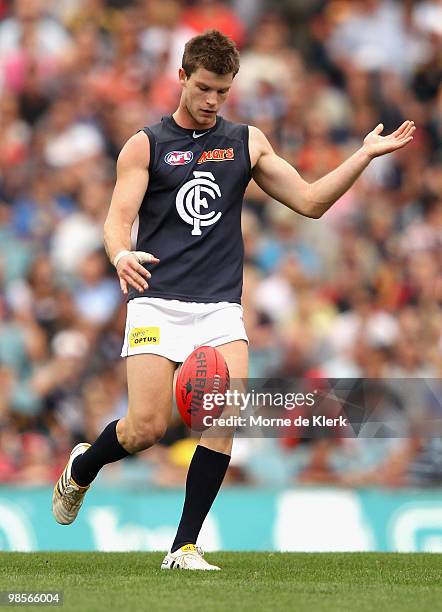 Bryce Gibbs of the Blues kicks during the round four AFL match between the Adelaide Crows and the Carlton Blues at AAMI Stadium on April 17, 2010 in...