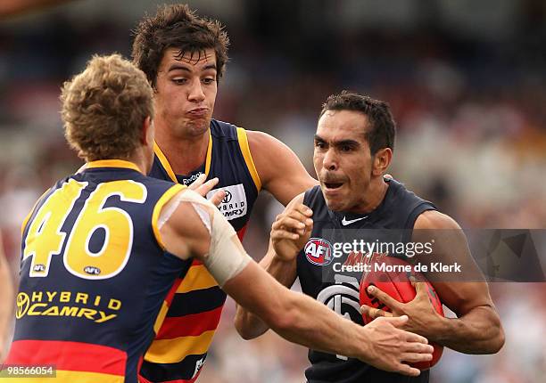 Eddie Betts of the Blues is tackled by Chris Schmidt and Taylor Walker of the Crows and during the round four AFL match between the Adelaide Crows...