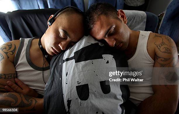 Corporal Jason Wharewera and Lance Corporal Frank Vokaty from the New Zealand Defence Force take a nap on the Boeing 757 enroute to Gallipoli on...