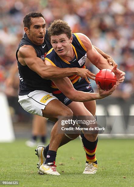 Eddie Betts of the Blues tackles Chris Schmidt of the Crows and during the round four AFL match between the Adelaide Crows and the Carlton Blues at...