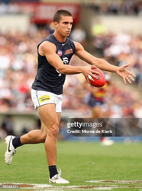 Andrew Carrazzo of the Blues runs with the ball during the round four AFL match between the Adelaide Crows and the Carlton Blues at AAMI Stadium on...