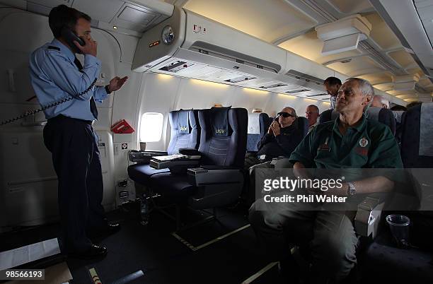 Wing Commander Brett Marshall speaks to the passengerson the New Zealand Airforce Boeing 757 enroute to Gallipoli on April 20, 2010 over Darwin,...