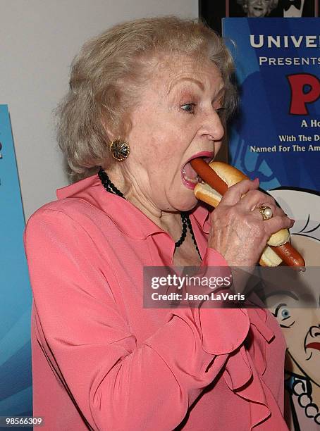 Actress Betty White unveils the "Naked" hot dog at Pink's Hot Dogs at Universal CityWalk on April 19, 2010 in Universal City, California.