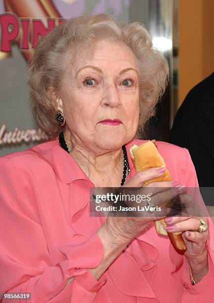 Actress Betty White unveils the "Naked" hot dog at Pink's Hot Dogs at Universal CityWalk on April 19, 2010 in Universal City, California.