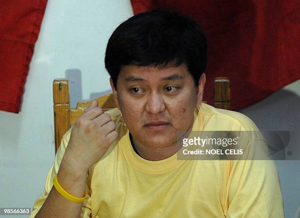 Detained Maguindanao massacre suspect Andal Ampatuan Jnr. Gestures during a press conference at Camp Bagong Diwa in the Manila suburg of Taguig on...