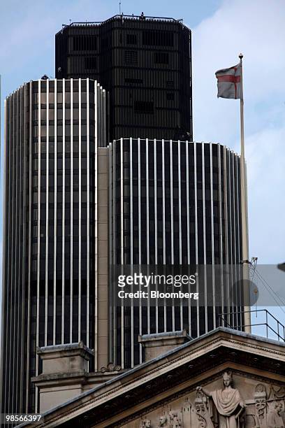 Tower 42, formerly the Nat West Tower, sits behind the Bank of England building in the financial district of London, U.K., on Monday, April 19, 2010....