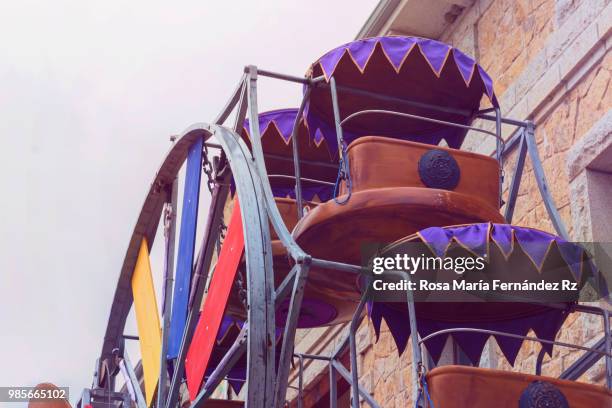 details of little ferris whell at anual medieval festival in manzanares el real, madrid, spain - rz stock pictures, royalty-free photos & images