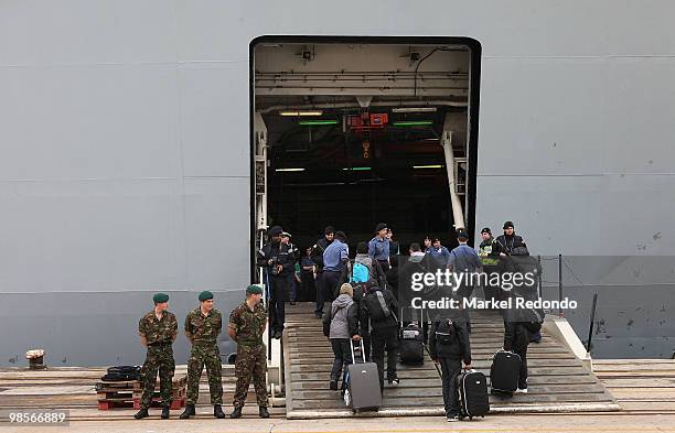 British passengers board HMS Albion at Santander port, on April 20, 2010 in Santander, Spain. The Royal Navy's HMS Albion has arrived at Santander to...