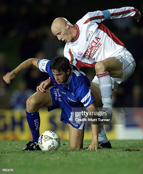Dominic Longo of The Stallions and Greg Owens of Olympic clash during the NSL first elimination final between Sydney Olympic and Marconi Stallions...