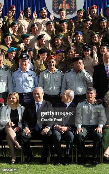 Israeli Prime Minister Benjamin Netanyahu, President Shimon Peres and IDF Chief of Staff Gabi Ashkenazi participate at a ceremony for outstanding...