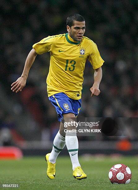 Brazilian defender Daniel Alves in action during the international friendly football match against Republic of Ireland on March 2, 2010 at the...