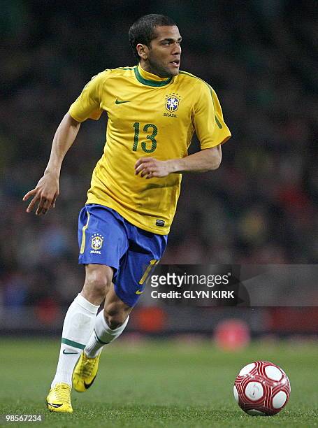 Brazilian defender Daniel Alves in action during the international friendly football match against Republic of Ireland on March 2, 2010 at the...