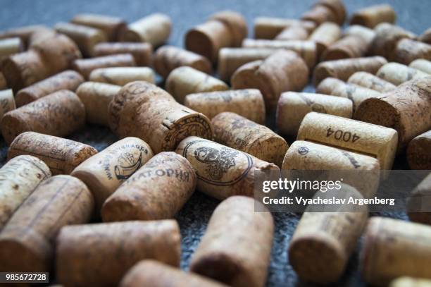 a collection of wine bottle cork stoppers (traditional cork closures) used for sealing wine bottles - cork stopper bildbanksfoton och bilder