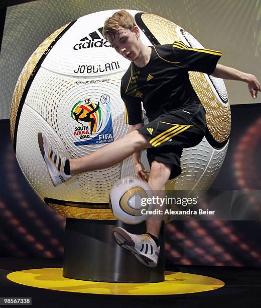 Ball artist Philippe plays with the new presented World Cup Final Matchball during the presentation of the FIFA World Cup 2010 final match ball on...