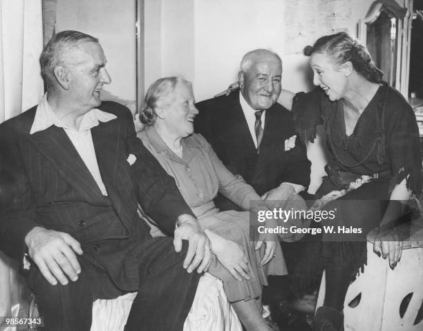 Welsh actress Doris Hare with guests Mr and Mrs Darwell and Mr McLennen from the Limpsfield Estate for merchant seamen, in her dressing room at the...