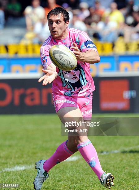 Stade Francais fly-half Lionel Beauxis passes the ball during the French Top 14 rugby union match Albi vs. Stade Francais on April 17, 2010 at the...