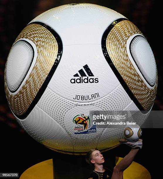 Ball artist Philippe plays with the new presented World Cup final matchball during the presentation of the FIFA World Cup 2010 final match ball on...