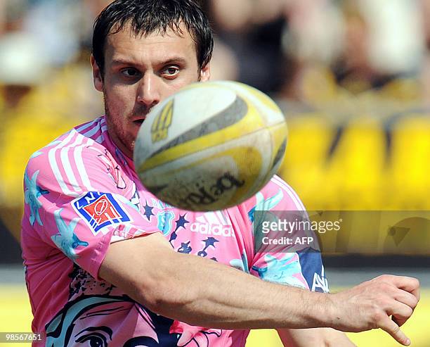 Stade Francais's fly-half Lionel Beauxis passes the ball during the French Top 14 rugby union match Albi vs. Stade Francais on April 17, 2010 at the...
