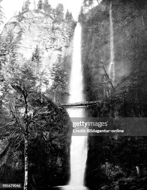 United States of America, the Multnomah Falls from the Columbia River, a wooden bridge leading across the Gorge, in the state of Oregaon,, digital...