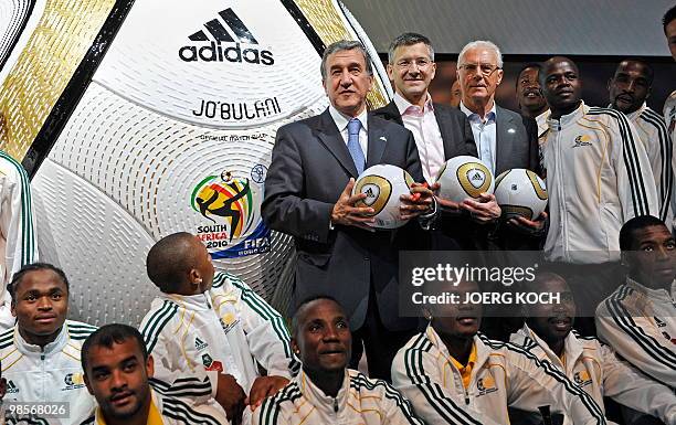 South African national football team coach Carlos Alberto Gomes Parreira from Brazil, Herbert Hainer, CEO of German sports equipment and clothing...