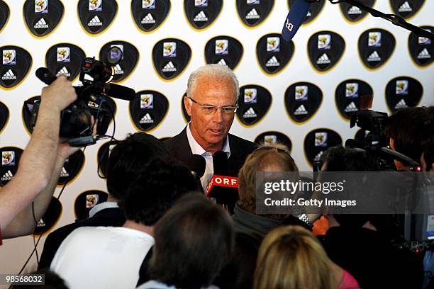 German football legend Franz Beckenbauer talks to the media during the presentation of the FIFA World Cup 2010 final match-ball at the brand center...