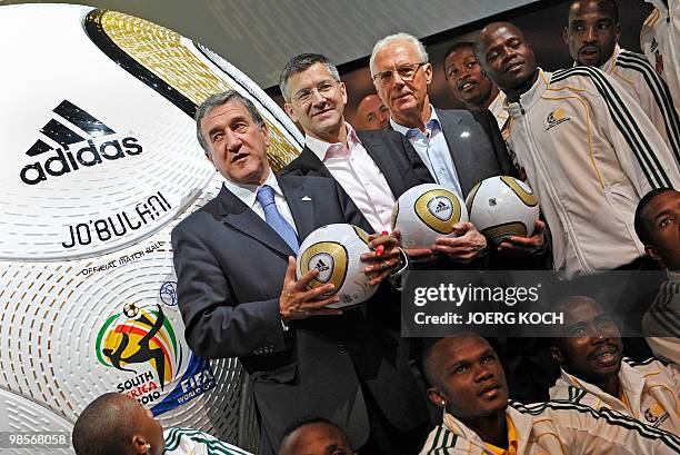 South African national football team coach Carlos Alberto Gomes Parreira from Brazil, Herbert Hainer, CEO of German sports equipment and clothing...