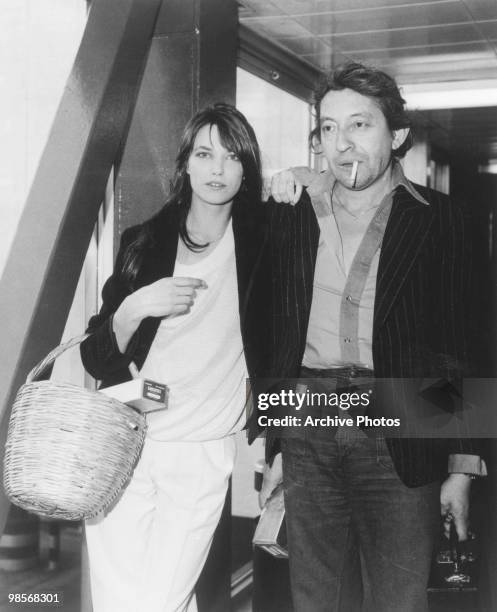 French singer, actor and director Serge Gainsbourg with his wife, English actress Jane Birkin, in London to publicise their film 'Je t'aime... Moi...