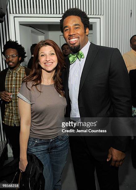 Reporter Rachel Nichols and Professional Football Player Dhani Jones pose for a photo at the exclusive viewing party for "Dhani Tackles The Globe" at...