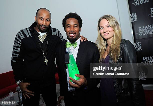 Linx of Tyku Spirits, Professional Football Player Dhani Jones and Larissa Milashenko of Tyku pose for a photo at the exclusive viewing party for...