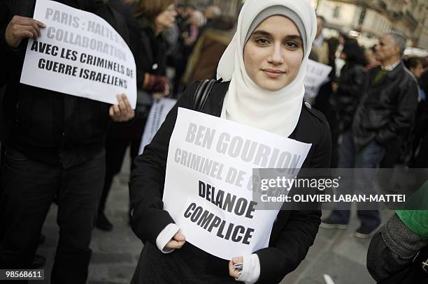 Members of the "Collectif national pour une paix juste et durable entre Palestiniens et Israeliens" gather to protest against the inauguration of a...