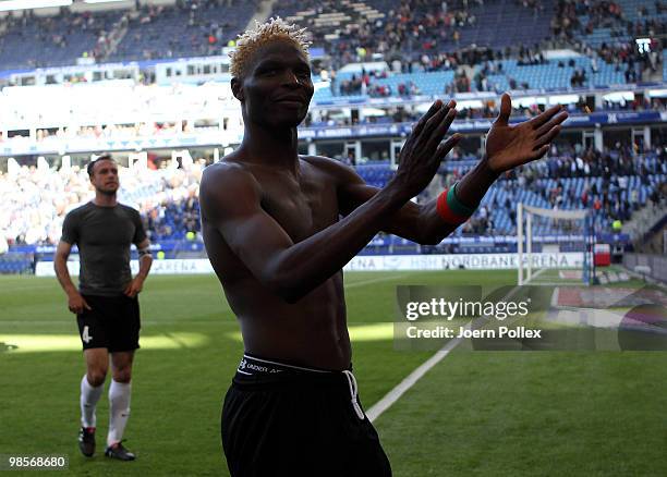 Aristide Bance of Mainz celebrates after winning the Bundesliga match between Hamburger SV and FSV Mainz 05 at HSH Nordbank Arena on April 17 in...