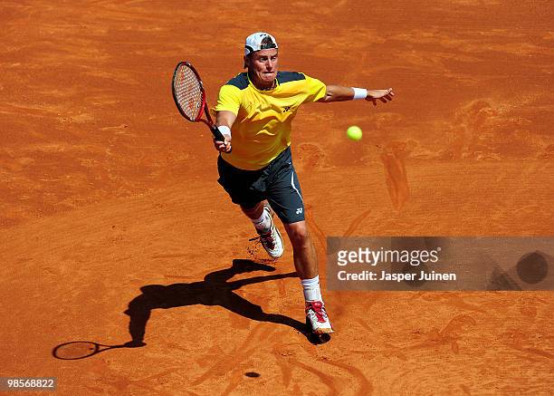 Lleyton Hewitt of Australia playes a forehand to Marsel Ilhan of Turkey on day two of the ATP 500 World Tour Barcelona Open Banco Sabadell 2010...