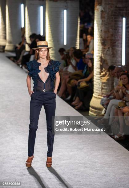 Model walks the runway for Antonio Miro show during the Barcelona 080 Fashion Week on June 27, 2018 in Barcelona, Spain.