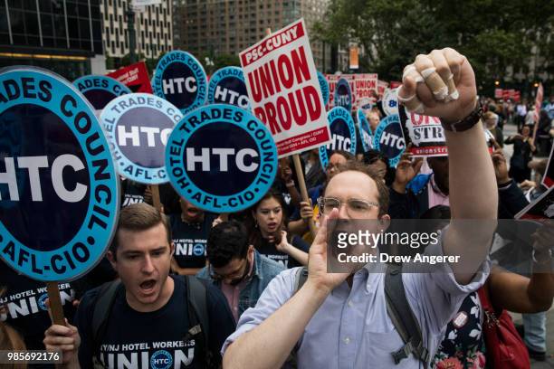 Union activists and supporters rally against the Supreme Court's ruling in the Janus v. AFSCME case, in Foley Square in Lower Manhattan, June 27,...