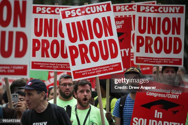 Union activists and supporters rally against the Supreme Court's ruling in the Janus v. AFSCME case, in Foley Square in Lower Manhattan, June 27,...