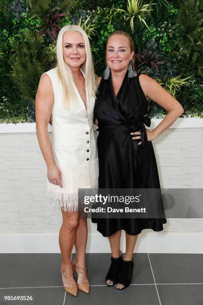 Caroline Mellor and Erica Bergsmeds attend a private view of photographer Erica Bergsmeds exhibition on June 27, 2018 in London, England.